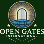 This is a picture of Open Gates International's logo. It's a green square and within that square it says Open Gates and then International below that. Above the text is an icon in the shape of a circle. It's an image of an arch or a gate that seems to be emitting a glow. Leading up to the arch is a blue color that almost gives water. On either side of the circle icon are two little gold stars.