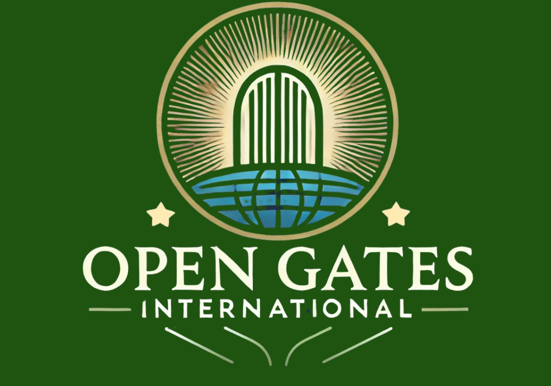 This is a picture of Open Gates International's logo. It's a green square and within that square it says Open Gates and then International below that. Above the text is an icon in the shape of a circle. It's an image of an arch or a gate that seems to be emitting a glow. Leading up to the arch is a blue color that almost gives water. On either side of the circle icon are two little gold stars.